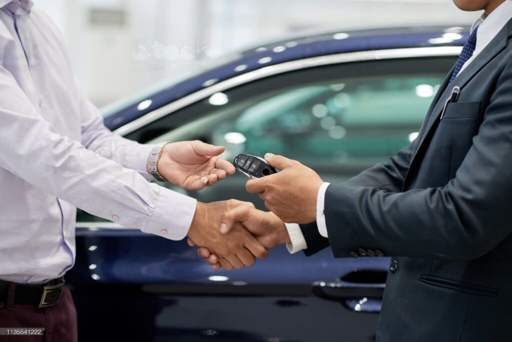 car deal handshake